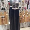 Moda vestido de fiesta azul marino brillantes y caída de raso